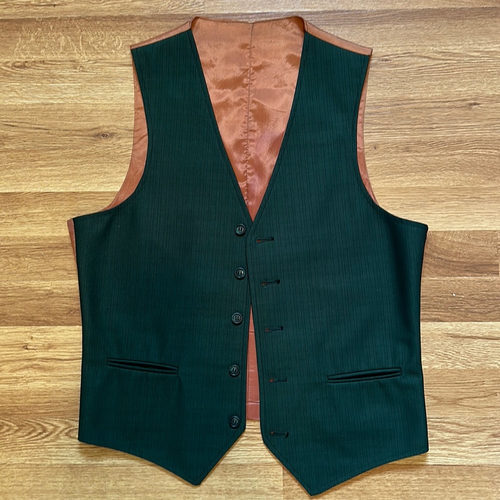 Vintage forest green vest with copper lining.